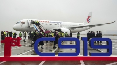 Footage broadcast Friday by CCTV showed the jet bearing the China Eastern insignia standing on a rainswept airfield. (AP) Footage broadcast Friday by CCTV showed the jet bearing the China Eastern insignia standing on a rainswept airfield. (AP)