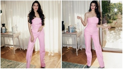 Jacqueline Fernandez recently reached the sets of the Kapil Sharma Show with Ranveer Singh to promote their upcoming film Cirkus. She graced the show wearing a pink strapless latex jumpsuit. (Instagram/@jacquelinef143) Jacqueline Fernandez recently reached the sets of the Kapil Sharma Show with Ranveer Singh to promote their upcoming film Cirkus. She graced the show wearing a pink strapless latex jumpsuit. (Instagram/@jacquelinef143)