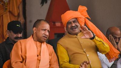 Lok Sabha speaker Om Birla and Uttar Pradesh chief minister Yogi Adityanath at a function in Gorakhpur on Saturday. (PTI PHOTO)