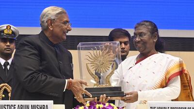 New Delhi, Dec 10 (ANI): President Droupadi Murmu is being presented a memento by Justice Arun Mishra, Chairperson of the National Human Rights Commission at the Human Rights Day celebration organised by the National Human Rights Commission, in New Delhi on Saturday. (ANI Photo) (Sanjay Sharma) New Delhi, Dec 10 (ANI): President Droupadi Murmu is being presented a memento by Justice Arun Mishra, Chairperson of the National Human Rights Commission at the Human Rights Day celebration organised by the National Human Rights Commission, in New Delhi on Saturday. (ANI Photo) (Sanjay Sharma)