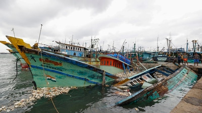 Damaged boats at the Kasimedu Fishing Harbour following Cyclone Mandous' landfall. (PTI) Damaged boats at the Kasimedu Fishing Harbour following Cyclone Mandous' landfall. (PTI)
