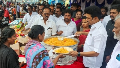 Tamil Nadu CM MK Stalin serves cooked food to the Cyclone Mandous affected people at Kasimedu fishing harbour, in Chennai. (PTI) Tamil Nadu CM MK Stalin serves cooked food to the Cyclone Mandous affected people at Kasimedu fishing harbour, in Chennai. (PTI)