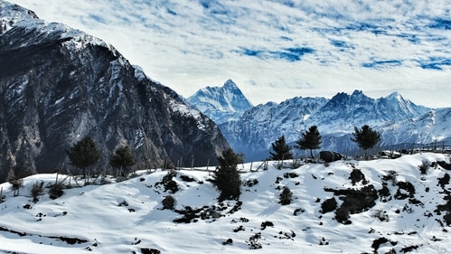 Auli, Uttarakhand: This small hill station in Uttarakhand is one of the best winter destinations in India and a ski resort. It is surrounded by the Nanda Devi and Nar Parvat mountains. (Unsplash) Auli, Uttarakhand: This small hill station in Uttarakhand is one of the best winter destinations in India and a ski resort. It is surrounded by the Nanda Devi and Nar Parvat mountains. (Unsplash)