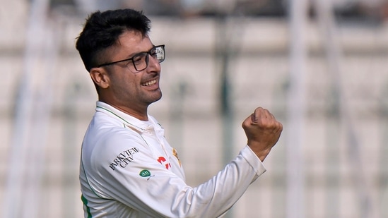 Pakistan's Abrar Ahmed celebrates after taking wicket of England's Ben Stokes during the first day of the second test cricket match between Pakistan and England, in Multan, Pakistan, Friday, Dec. 9, 2022. (AP)