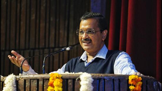 Delhi chief minister Arvind Kejriwal interacts with the newly elected AAP councillors in New Delhi on Saturday. (HT Photo)