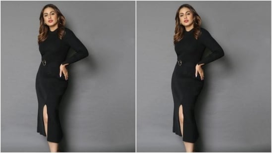 Huma decked up in the black long dress featuring turtle neck details, full sleeves, a black belt with a golden buckle at the waist and one thigh high slit.&nbsp;(Instagram/@iamhumaq)