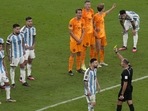 Referee Antonio Mateu shows a yellow card to Argentina's Lionel Messi during the World Cup quarterfinal soccer match between the Netherlands and Argentina, at the Lusail Stadium in Lusail, Qatar, Saturday, Dec. 10, 2022.(AP) Referee Antonio Mateu shows a yellow card to Argentina's Lionel Messi during the World Cup quarterfinal soccer match between the Netherlands and Argentina, at the Lusail Stadium in Lusail, Qatar, Saturday, Dec. 10, 2022.(AP)