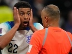 Jude Bellingham reacts in front of referee Wilton Sampaio during the FIFA World Cup quarterfinal against France(AP) Jude Bellingham reacts in front of referee Wilton Sampaio during the FIFA World Cup quarterfinal against France(AP)