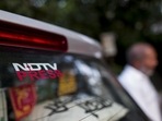 Signage of the New Delhi Television Ltd. (NDTV) on a car.