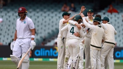 Australian players celebrate the wicket of the West Indies' Joshua de Silva, left, on the fourth day of their cricket test match in Adelaide, Sunday, Nov. 11, 2022. (AP) Australian players celebrate the wicket of the West Indies' Joshua de Silva, left, on the fourth day of their cricket test match in Adelaide, Sunday, Nov. 11, 2022. (AP)