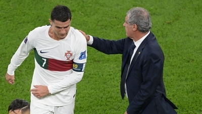 Portugal's coach Fernando Santos pats Portugal's forward Cristiano Ronaldo Portugal's coach Fernando Santos pats Portugal's forward Cristiano Ronaldo