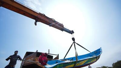 Fishermen gear to venture into the sea with fibre boats as the cyclone Mandous crossed the Tamil Nadu coast, at Kasimedu fishing harbour, in Chennai. (PTI) Fishermen gear to venture into the sea with fibre boats as the cyclone Mandous crossed the Tamil Nadu coast, at Kasimedu fishing harbour, in Chennai. (PTI)