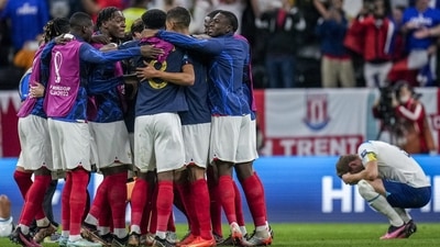 Harry Kane reacts as France players celebrate their victory over England at FIFA World Cup 2022 quarterfinal (AP) Harry Kane reacts as France players celebrate their victory over England at FIFA World Cup 2022 quarterfinal (AP)