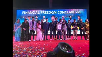 YouTubers receiving the Guinness World Record certificate at IGP Lucknow on Sunday. (HT Photo)