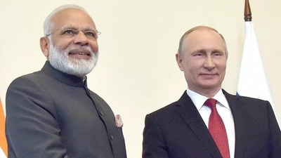 Prime Minister Narendra Modi shakes hands with Russian President Vladimir Putin. (PTI) Prime Minister Narendra Modi shakes hands with Russian President Vladimir Putin. (PTI)