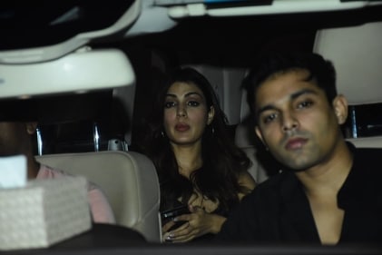 Rhea and Showik in the car. Rhea and Showik in the car.