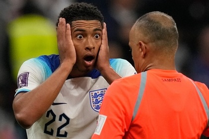 Jude Bellingham reacts in front of referee Wilton Sampaio during the FIFA World Cup quarterfinal against France (AP) Jude Bellingham reacts in front of referee Wilton Sampaio during the FIFA World Cup quarterfinal against France (AP)