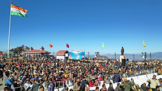 Crowd of people gather to attend the swearing-in ceremony of Sukhvinder Singh Sukhu, in Shimla on Sunday. (ANI)