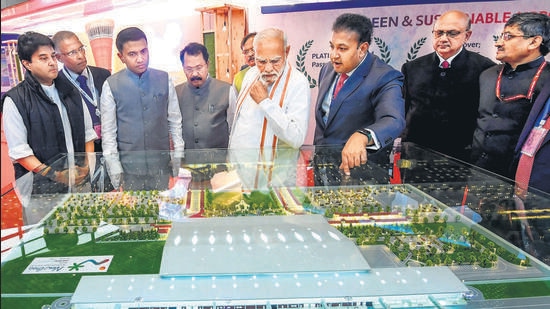 PM Narendra Modi with Union civil aviation minister Jyotiraditya Scindia, Goa CM Pramod Sawant, and officials at the inauguration of the first phase of the international airport in Mopa on Sunday. (PTI)