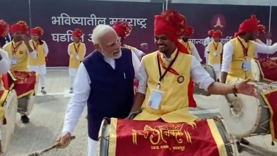 Prime Minister Narendra Modi playing drums as he received a traditional welcome in Nagpur. (PMO)