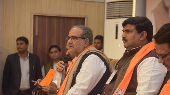 U.P. BJP chief Bhupendra Singh Chaudhary and party general secretary (organisation) Dharampal at a party meeting to finalise candidates and prepare the strategy for the civic polls in Uttar Pradesh. (SOURCED IMAGE )