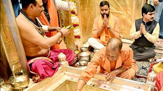Uttar Pradesh chief minister Yogi Adityanath offers prayers at Kashi Vishwanath temple in Varanasi. (ANI PHOTO) Uttar Pradesh chief minister Yogi Adityanath offers prayers at Kashi Vishwanath temple in Varanasi. (ANI PHOTO)