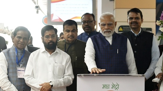 Prime Minister Narendra Modi inaugurates Phase-1 of the Nagpur Metro rail project, as Union Minister for Road Transport and Highways Nitin Gadkari, Maharashtra Chief Minister Eknath Shinde and State Deputy Chief Minister Devendra Fadnavis look on, in Nagpur on Sunday. (ANI Photo)(Narendra Modi Twitter)