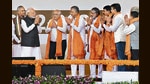 Prime Minister Narendra Modi exchanges greetings with Gujarat chief minister Bhupendra Patel (third from left) and other BJP leaders, at the oath-taking ceremony in Gandhinagar on Monday. (ANI) Prime Minister Narendra Modi exchanges greetings with Gujarat chief minister Bhupendra Patel (third from left) and other BJP leaders, at the oath-taking ceremony in Gandhinagar on Monday. (ANI)