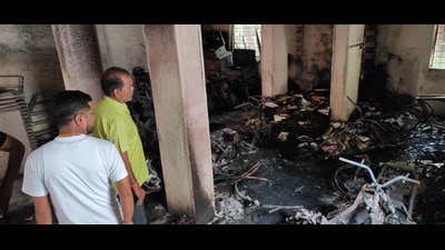 As many as 15 electric bikes were gutted in a fire incident at Triveni Housing Society in Talawade area on Monday midnight. (HT PHOTO)