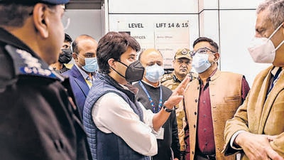 Civil aviation minister Jyotiraditya Scindia speaks to officials, at Terminal 3 of IGI Airport in New Delhi on Monday. (PTI) Civil aviation minister Jyotiraditya Scindia speaks to officials, at Terminal 3 of IGI Airport in New Delhi on Monday. (PTI)