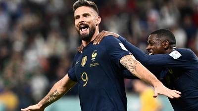 France's forward Olivier Giroud celebrates after he scored during the Qatar 2022 World Cup Group D football match between France and Australia at the Al-Janoub Stadium France's forward Olivier Giroud celebrates after he scored during the Qatar 2022 World Cup Group D football match between France and Australia at the Al-Janoub Stadium