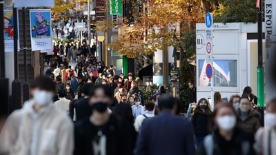 Japan: People along a street in the Omotesando area in Tokyo, Japan. (Bloomberg) Japan: People along a street in the Omotesando area in Tokyo, Japan. (Bloomberg)