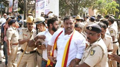Police personnel detain Karnataka Rakshana Vedike supporters during a protest over the Maharashtra-Karnataka border dispute, at Hire Bagewadi, in Belagavi. (ANI) Police personnel detain Karnataka Rakshana Vedike supporters during a protest over the Maharashtra-Karnataka border dispute, at Hire Bagewadi, in Belagavi. (ANI)