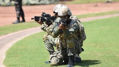 The Indian Air Force (IAF) Special Force's Garud commandos take position during a mock operation (AFP File Photo) The Indian Air Force (IAF) Special Force's Garud commandos take position during a mock operation (AFP File Photo)