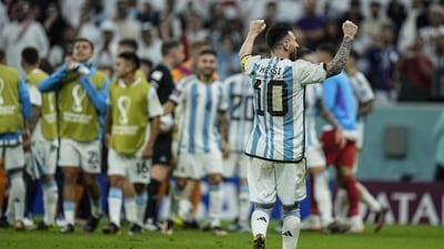 Argentina's Lionel Messi celebrates with teammates at the end of the World Cup quarterfinal match (AP) Argentina's Lionel Messi celebrates with teammates at the end of the World Cup quarterfinal match (AP)