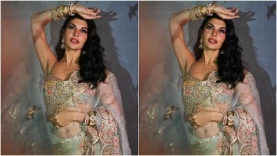 Jacqueline looked every bit gorgeous in an ivory white organza saree featuring heavy embellishments and zari work at the borders. She teamed it with a slip silver blouse with multicoloured sequin and embellishment details with a plunging neckline. (Instagram/@jacquelinef143) Jacqueline looked every bit gorgeous in an ivory white organza saree featuring heavy embellishments and zari work at the borders. She teamed it with a slip silver blouse with multicoloured sequin and embellishment details with a plunging neckline. (Instagram/@jacquelinef143)