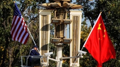 US-China Talks: US and China flags are seen. (Reuters File) US-China Talks: US and China flags are seen. (Reuters File)