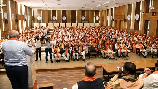 Outgoing (and incoming) Gujarat chief minister Bhupendra Patel addressesthe newly-elected BJP MLAs' at the party office in Gandhinagar on Saturday. (ANI Photo)