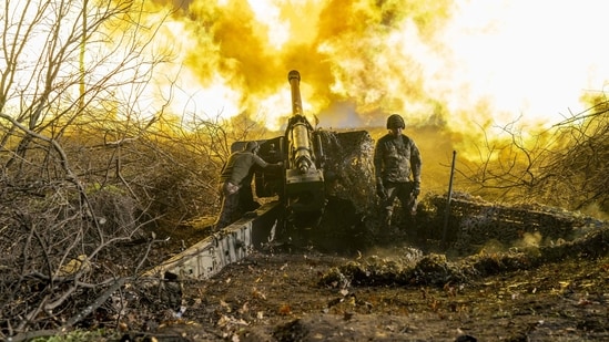 Russia-Ukraine War: A Ukrainian soldier of an artillery unit fires towards Russian positions outside Bakhmut.(AFP)