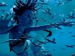 Trinity Bliss, as Tuk, in a scene from Avatar: The Way of Water. (20th Century Studios via AP)