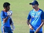 India's cricket coach Rahul Dravid (R) speaks with Abhimanyu Easwaran during a practice session at the Zahur Ahmed Chowdhury Stadium in Chittagong on December 11, 2022, ahead of their first cricket Test match against Bangladesh. (Photo by Munir uz zaman / AFP)(AFP) India's cricket coach Rahul Dravid (R) speaks with Abhimanyu Easwaran during a practice session at the Zahur Ahmed Chowdhury Stadium in Chittagong on December 11, 2022, ahead of their first cricket Test match against Bangladesh. (Photo by Munir uz zaman / AFP)(AFP)