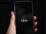 Uber's logo is displayed on a mobile phone in London, Britain on September 14.(REUTERS) Uber's logo is displayed on a mobile phone in London, Britain on September 14.(REUTERS)