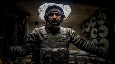 A Ukrainian artilleryman from the 24th brigade stands inside of a 2S1 Gvozdika self-propelled howitzer along the front line in the vicinity of Bakhmut, Donetsk region, on December 10. The General Staff of Ukraine's Armed Forces said its forces had repelled a Russian attack on the frontline town, Reuters reported. (Ihor Tkachov / AFP) A Ukrainian artilleryman from the 24th brigade stands inside of a 2S1 Gvozdika self-propelled howitzer along the front line in the vicinity of Bakhmut, Donetsk region, on December 10. The General Staff of Ukraine's Armed Forces said its forces had repelled a Russian attack on the frontline town, Reuters reported. (Ihor Tkachov / AFP)