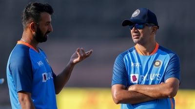 India's Cheteshwar Pujara, left, talks to coach Rahul Dravid during a practice session ahead of their first test cricket match against Bangladesh in Chattogram, Bangladesh, Sunday, Dec. 11, 2022. (AP Photo/Surjeet Yadav) (AP) India's Cheteshwar Pujara, left, talks to coach Rahul Dravid during a practice session ahead of their first test cricket match against Bangladesh in Chattogram, Bangladesh, Sunday, Dec. 11, 2022. (AP Photo/Surjeet Yadav) (AP)