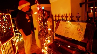 Children made hand-drawn pictures of Santa Claus and posted them in a box at his house. (REUTERS)