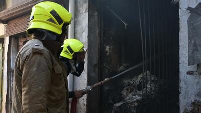 Firefighters dousing the fire at the factory in Hallomajra, Chandigarh, on Tuesday. (Keshav Singh/HT)