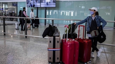 Hong Kong is lifting some of its last remaining Covid restrictions including the scrapping of the scanning app following China’s rapid shift away from the zero-tolerance approach. Overseas arrivals could now visit bars and restaurants from the moment they land in a further easing of Covid restrictions. (AFP) Hong Kong is lifting some of its last remaining Covid restrictions including the scrapping of the scanning app following China’s rapid shift away from the zero-tolerance approach. Overseas arrivals could now visit bars and restaurants from the moment they land in a further easing of Covid restrictions. (AFP)