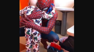The image, taken from the viral Instagram video, shows the man dressed up as Spider-Man surprising a kid. (Instagram/@goodnews_movement)