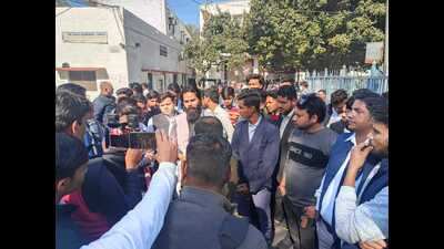 Student groups protest demanding arrest of two AMU students on Tuesday in Aligarh. (HT)