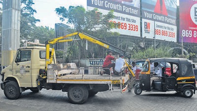 Traffic police sideline the autos parked outside RTO in Pune. (Shankar Narayan/HT PHOTO)